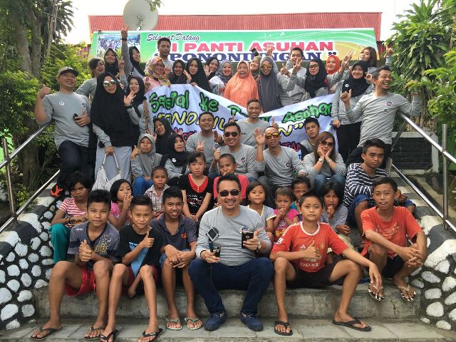 Anjangsana ke panti asuhan oleh Komunitas Milenium Angkatan 2000